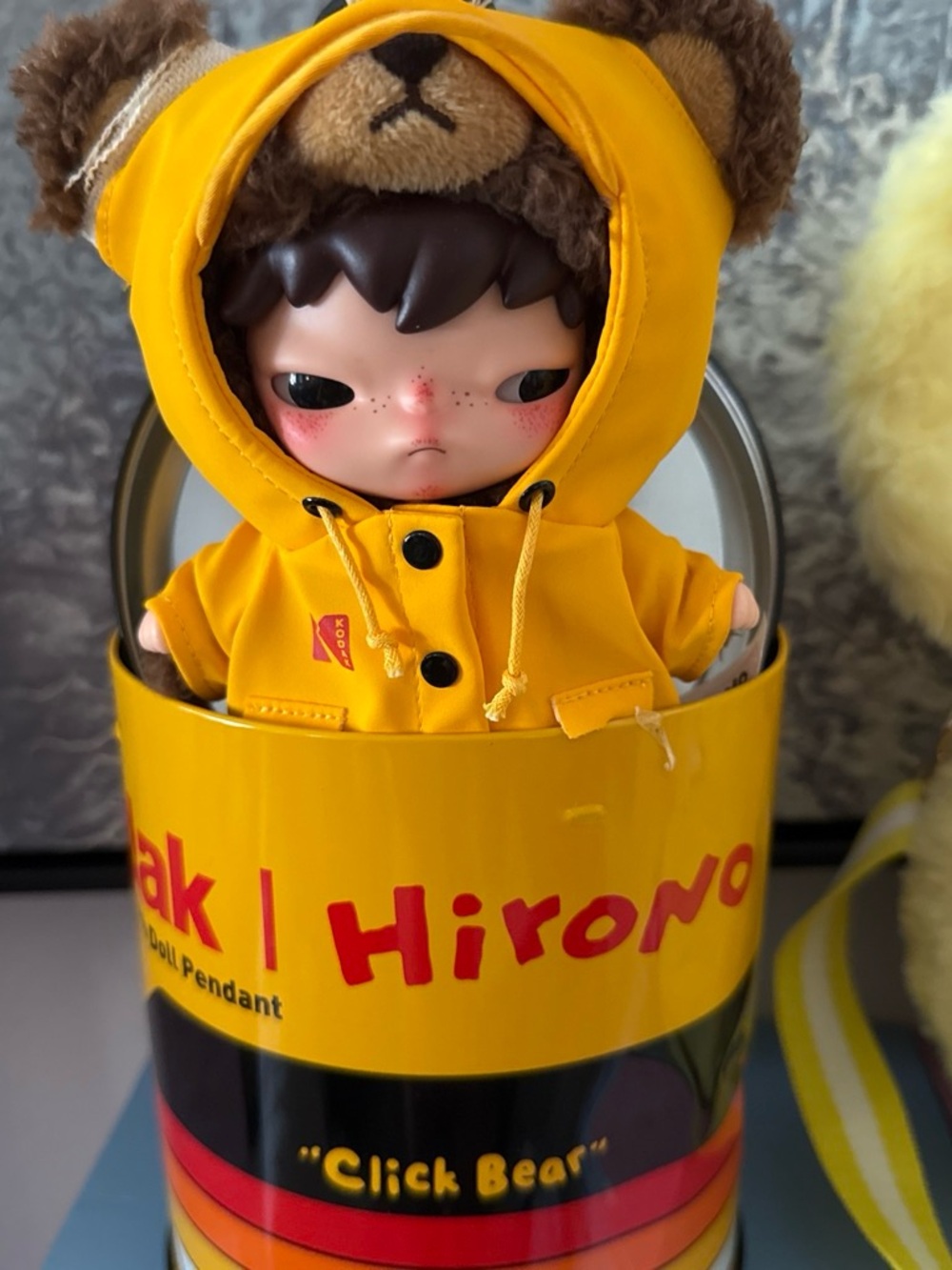 Kodak Hirono Click Bear Yellow Hooded Doll Pendant - confirmed.